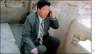 Chinese man taking phone call